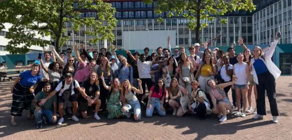 A large crowd of summer school students posing for a photo together